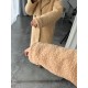 Шубка из меха барашка с карманами на пуговицах длиной миди бежевый